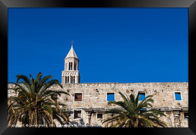 Diocletian's Palace standing above the palm trees  Framed Print by Jason Wells