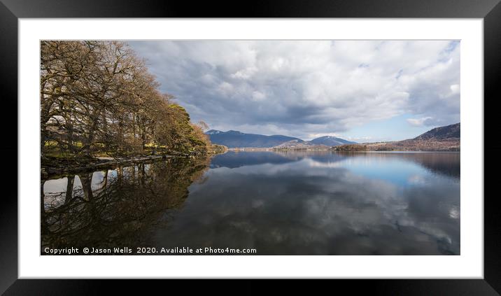 Trees and mountains reflect in Derwent Water Framed Mounted Print by Jason Wells