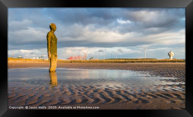 Iron Man in a pool of water at low tide Framed Print by Jason Wells