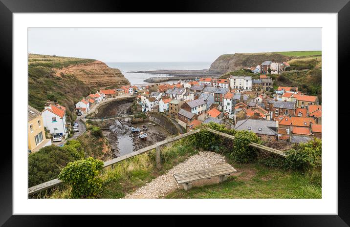 Bench looking down on Staithes Framed Mounted Print by Jason Wells