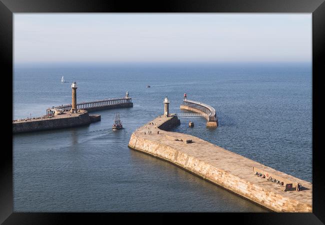 Boat exiting Whitby Framed Print by Jason Wells