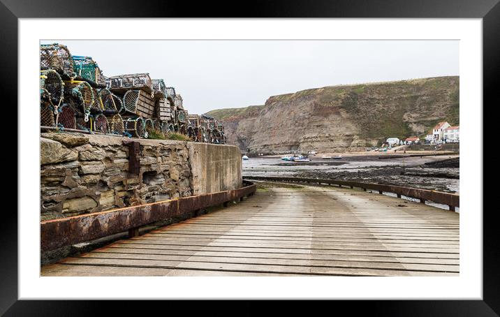 Slipway down to the shoreline at Staithes Framed Mounted Print by Jason Wells