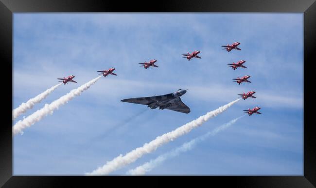 Vulcan and Red Arrows flypast Framed Print by Jason Wells