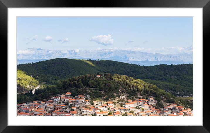 Tiny chuch above the village of Blato Framed Mounted Print by Jason Wells