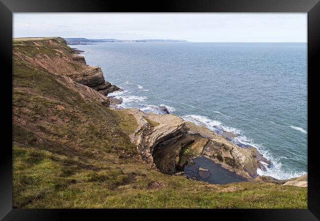 Large pool of water in Filey Brigg Framed Print by Jason Wells