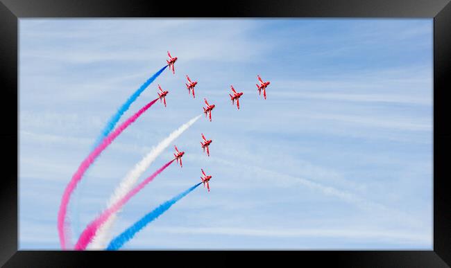 The Red Arrows in tight formation Framed Print by Jason Wells