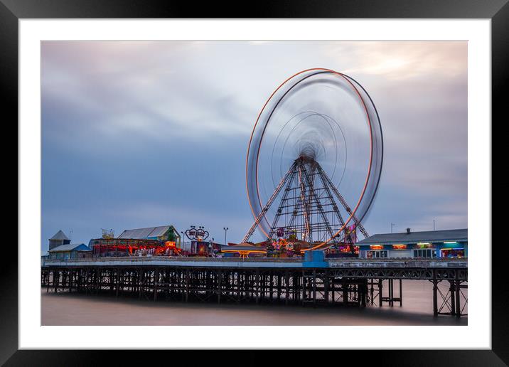 Ferris wheel spinning on Blackpool's Central Pier Framed Mounted Print by Jason Wells