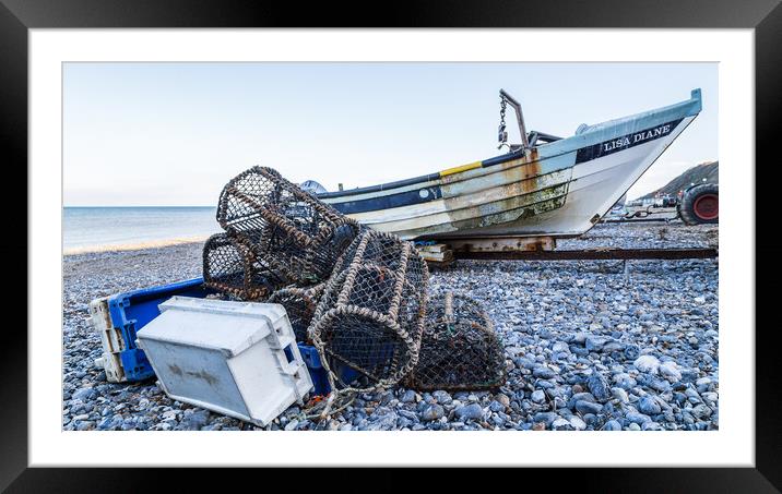 Fishing boat with its crab and lobser pots on the shore Framed Mounted Print by Jason Wells