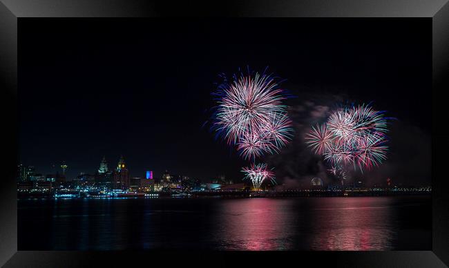 Colourful fireworks above the Liverpool skyline Framed Print by Jason Wells