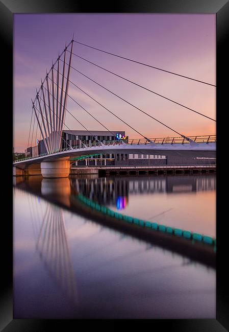  Sunset over the bridge Framed Print by Paul Feeley