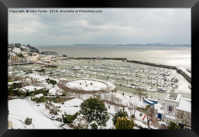 Torquay Harbour In The Snow Framed Print by John Fowler
