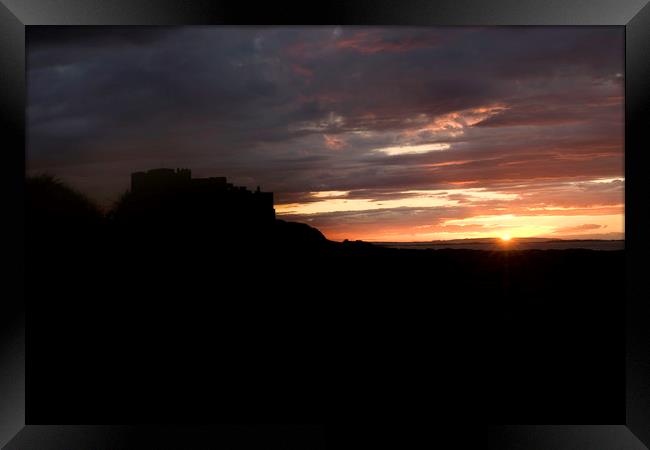 Bamburgh Castle at Sunset Framed Print by Ivan Kovacs