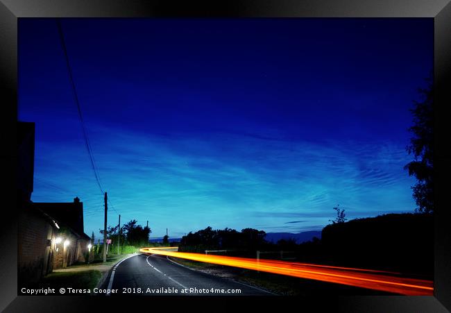 Noctilucent clouds glow above the cars  Framed Print by Teresa Cooper
