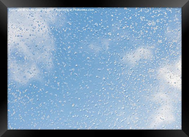 Melting snow drops blue sky Framed Print by Arletta Cwalina
