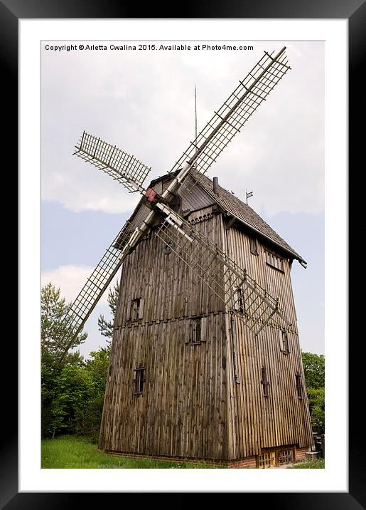 old wood windmill with sails in Poland  Framed Mounted Print by Arletta Cwalina