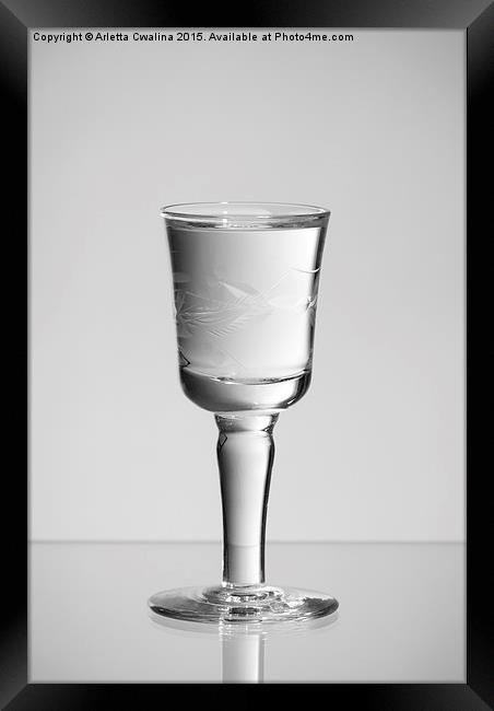 One stem glass of clear vodka Framed Print by Arletta Cwalina