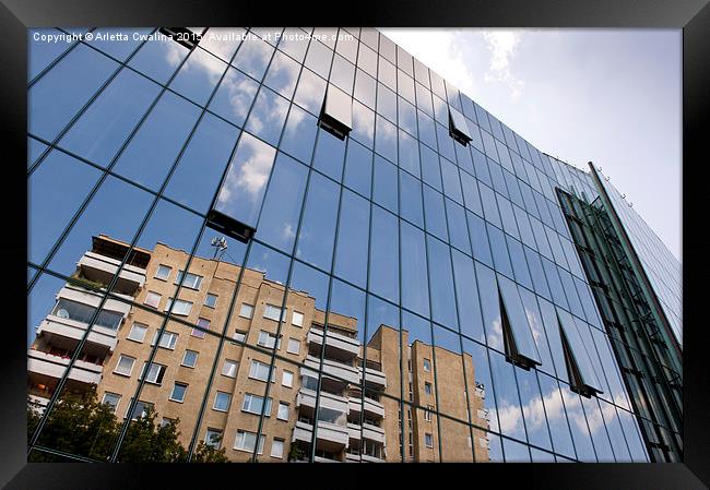 glass skyscraper and old building in reflection Framed Print by Arletta Cwalina