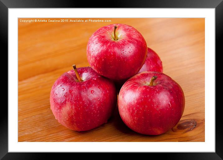 ripe red apples dewed in pile  Framed Mounted Print by Arletta Cwalina