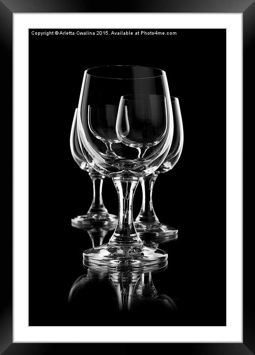 Three empty wine glasses on black Framed Mounted Print by Arletta Cwalina