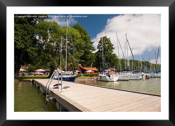 Masuria lake harbor boardwalk Framed Mounted Print by Arletta Cwalina