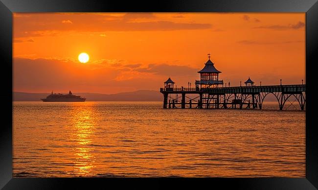 Sun setting at Clevedon Pier. Framed Print by Dean Merry