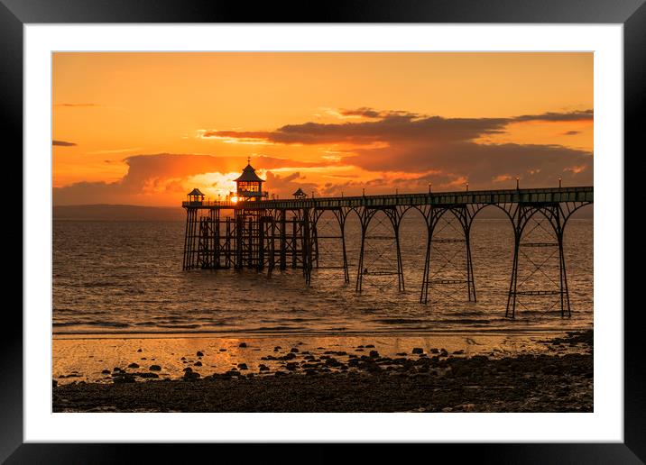 Sun setting at Clevedon Pier Framed Mounted Print by Dean Merry