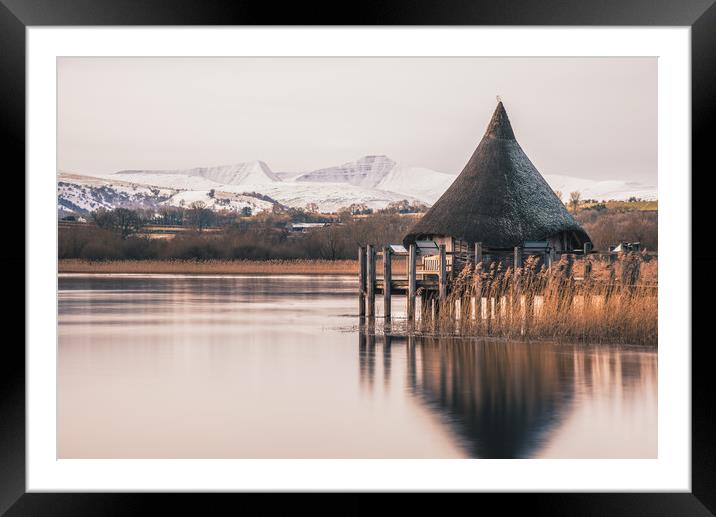 A Recreation of an Iron Age Hut, Lakeside Framed Mounted Print by Dean Merry