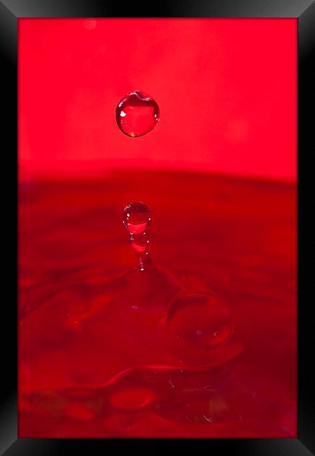 Red Water Splash Framed Print by andy myatt