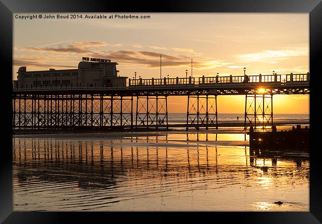 Worthing pier West Sussex Uk. Just before sunset Framed Print by John Boud
