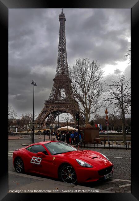 Red Ferrari in front of the Eiffel Tower Framed Print by Ann Biddlecombe