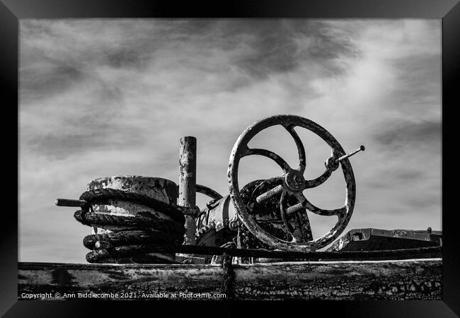 An old barge anchor winch in monochrome Framed Print by Ann Biddlecombe