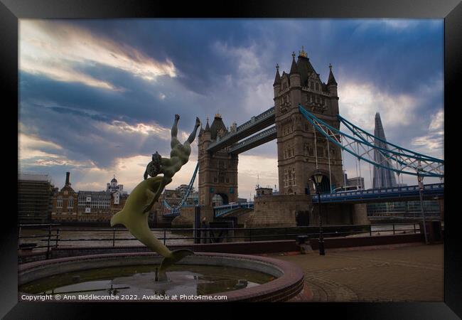 A statue in front of Tower Bridge Framed Print by Ann Biddlecombe