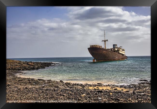 Shipwreck on the walk from Costa Teguise to Arrecife Framed Print by Ann Biddlecombe