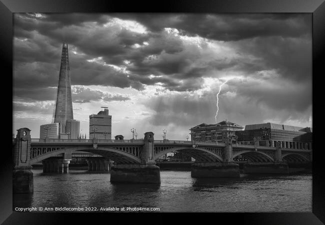 The Shard behind the Southwark Bridge in monochrome Framed Print by Ann Biddlecombe