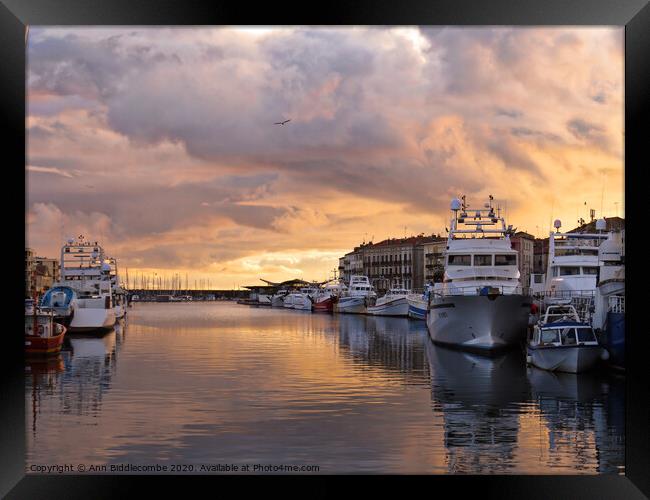 Sunset over Sete Quai Framed Print by Ann Biddlecombe