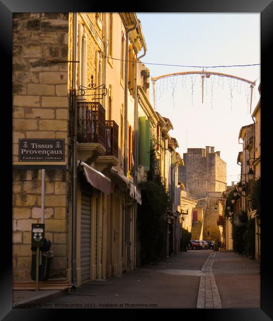 A street inside Aigues Mortes Framed Print by Ann Biddlecombe