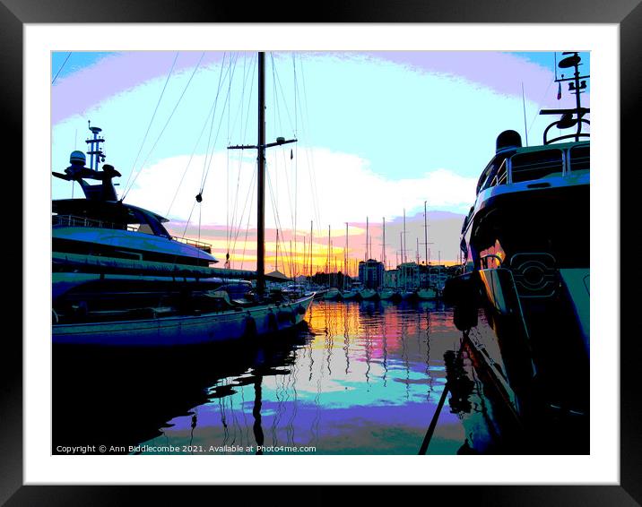 A posterized sunset behind the boats in Cannes Framed Mounted Print by Ann Biddlecombe