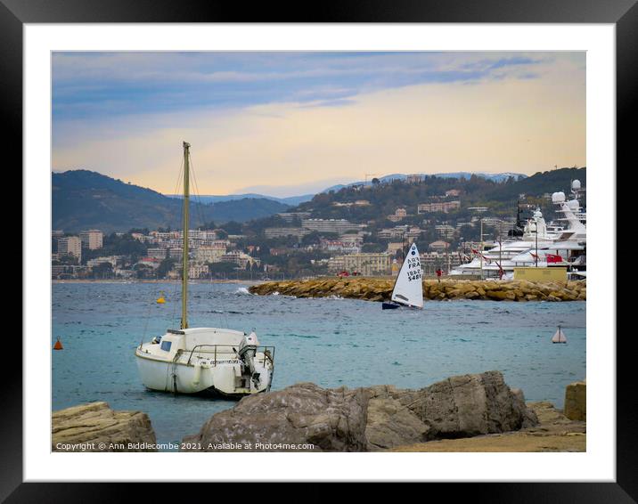 Learning to sail in Cannes Framed Mounted Print by Ann Biddlecombe