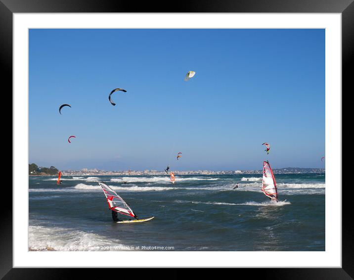 windsurfers and kite surfers on Palm beach Framed Mounted Print by Ann Biddlecombe