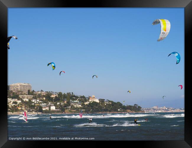 kite surfers and windsurfers on Palm beach Framed Print by Ann Biddlecombe