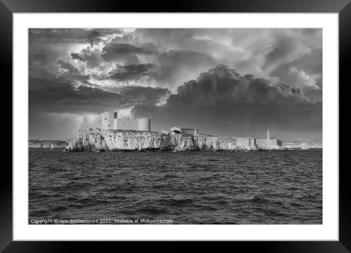 The Chateau d'If  under stormy skys in monochrome Framed Mounted Print by Ann Biddlecombe