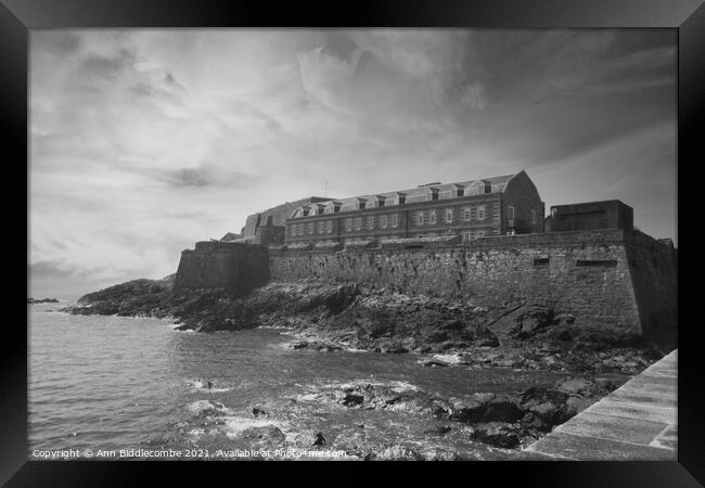 Castle Cornet in Guernsey in monochrome Framed Print by Ann Biddlecombe