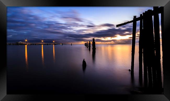 Dawn Breaks over the Pier Framed Print by Peta Thames