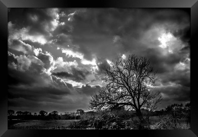 Storms Clouds Gather.  Framed Print by Peter Bunker