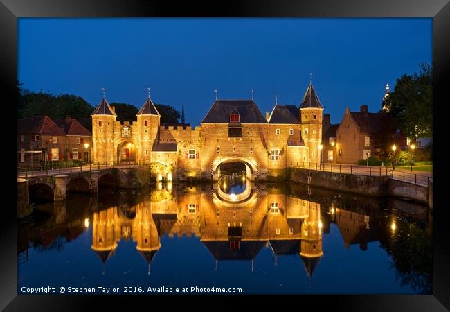 The Koppelpoort reflected at night Framed Print by Stephen Taylor