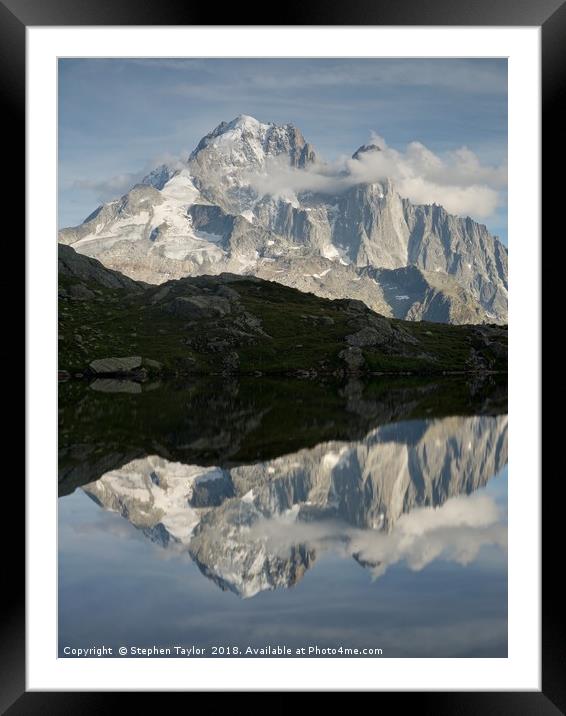 The Dru reflected in Lac des Cheserys Framed Mounted Print by Stephen Taylor