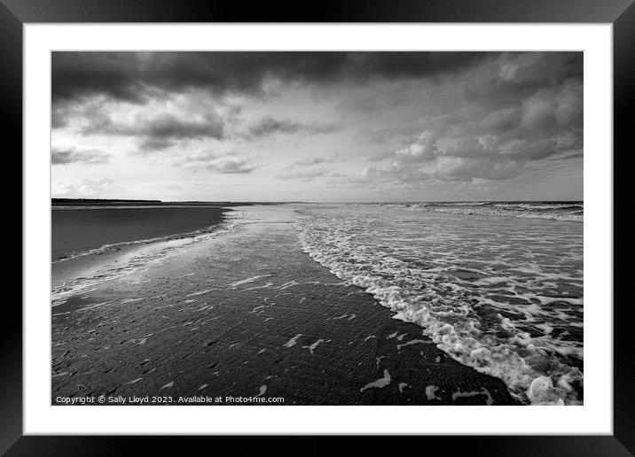 Winter tide at Holkham Beach Norfolk Framed Mounted Print by Sally Lloyd