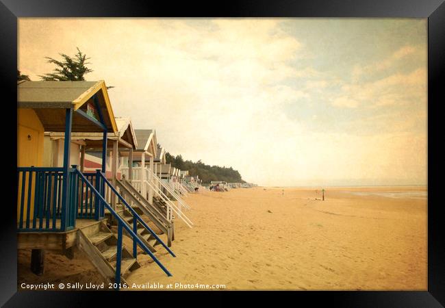 Beach huts vintage style. Framed Print by Sally Lloyd