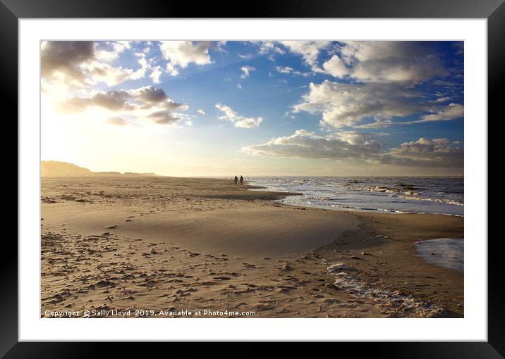 Couple on the beach at Wells-next-the-Sea Norfolk  Framed Mounted Print by Sally Lloyd
