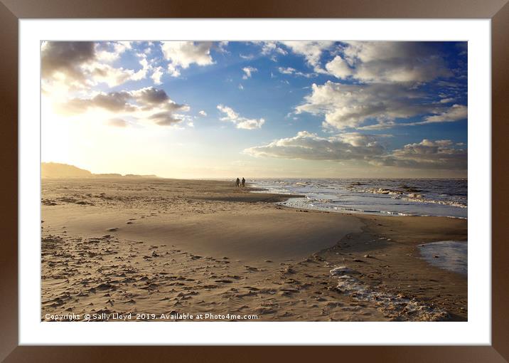 Couple on the beach at Wells-next-the-Sea Norfolk  Framed Mounted Print by Sally Lloyd